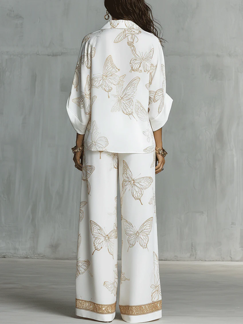 Amelia | White shirt and wide-leg trousers with golden butterfly print